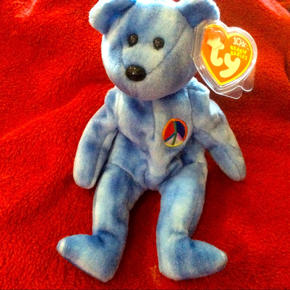Ty peace sign Bear bluish birthdate Nov 1 7 2002